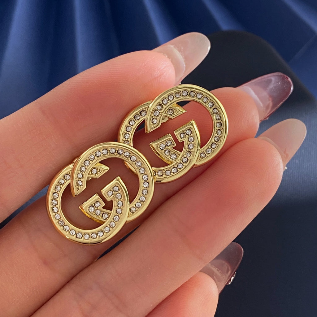 Double-G Emblem Brooch in Gold-Tone – Crystal Detail styled product view