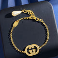 Double-G Emblem Brooch in Gold-Tone – Crystal Detail – Design 003 main product view