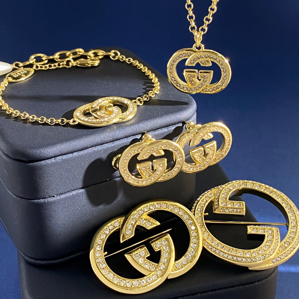 Double-G Emblem Brooch in Gold-Tone – Crystal Detail – Design 003 front product view