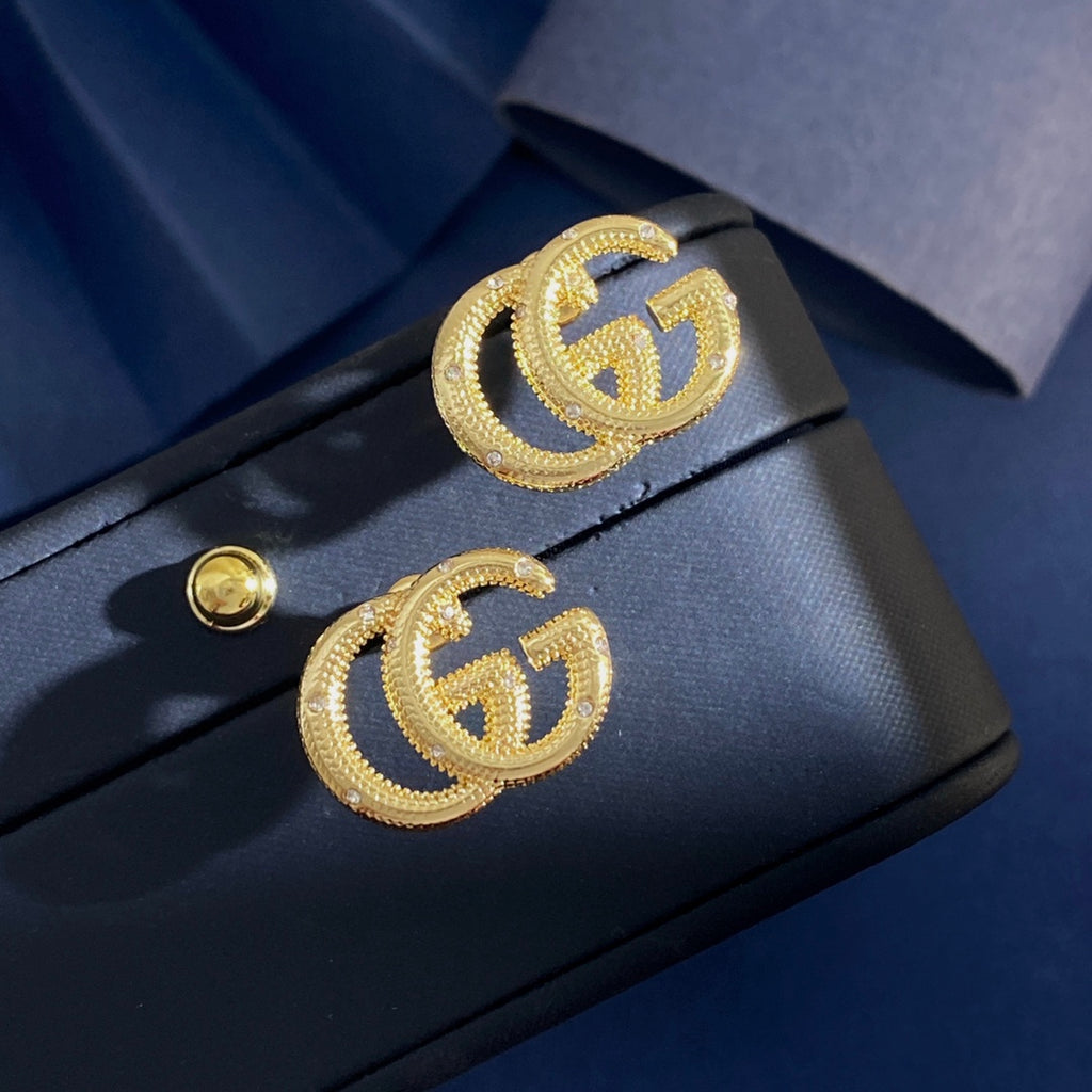 Double-G Emblem Stud Earrings in Gold-Tone – Design 005 detail view