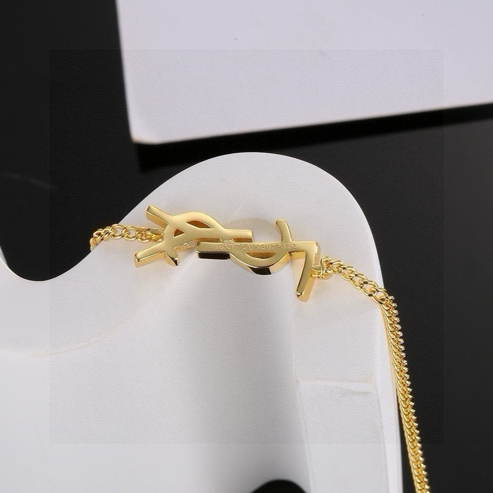Geometric Emblem Bracelet in Polished Metal-Tone main product view
