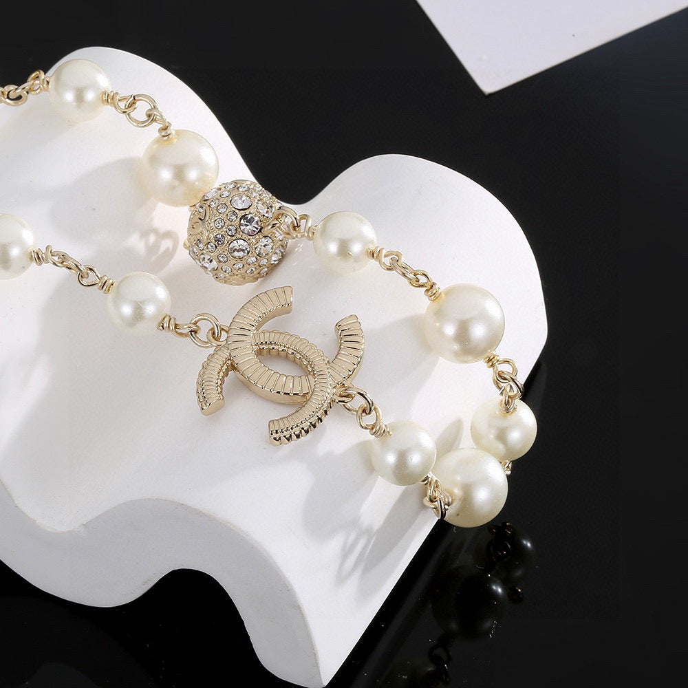 Double-C Emblem Pearl-Detail Pendant Necklace – Pearl Detail – Design 058 side detail