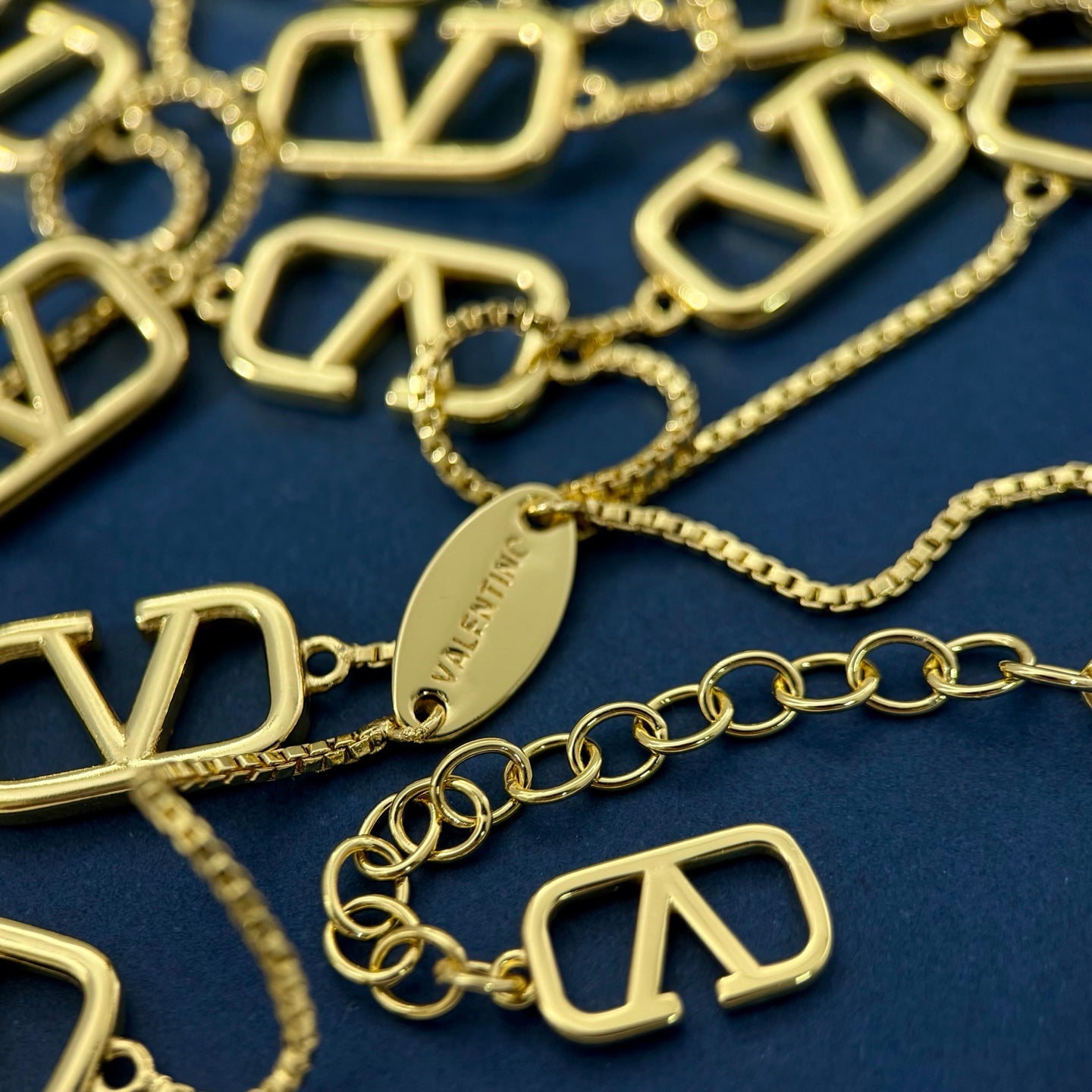 V Emblem Long Pendant Necklace – Design 02 close-up view
