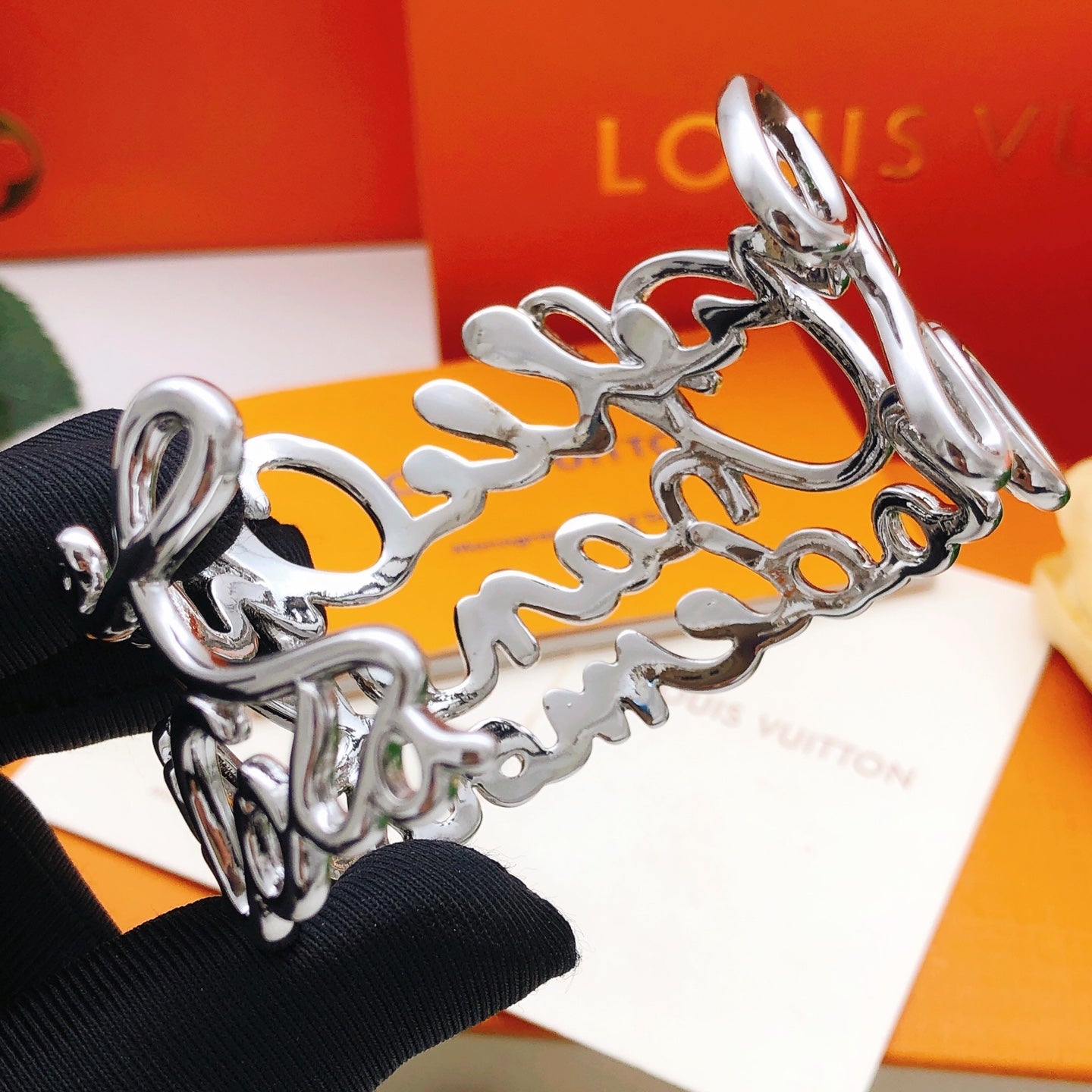 Letter Emblem Bangle in Silver-Tone close-up detail