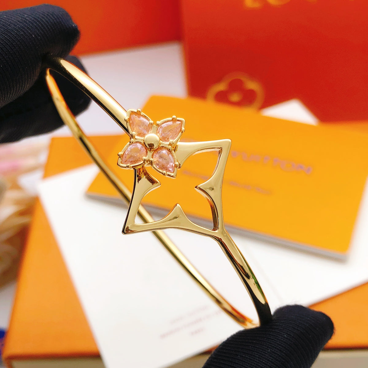 Geometric Emblem Bangle in Gold-Tone – Pink Detail front product view