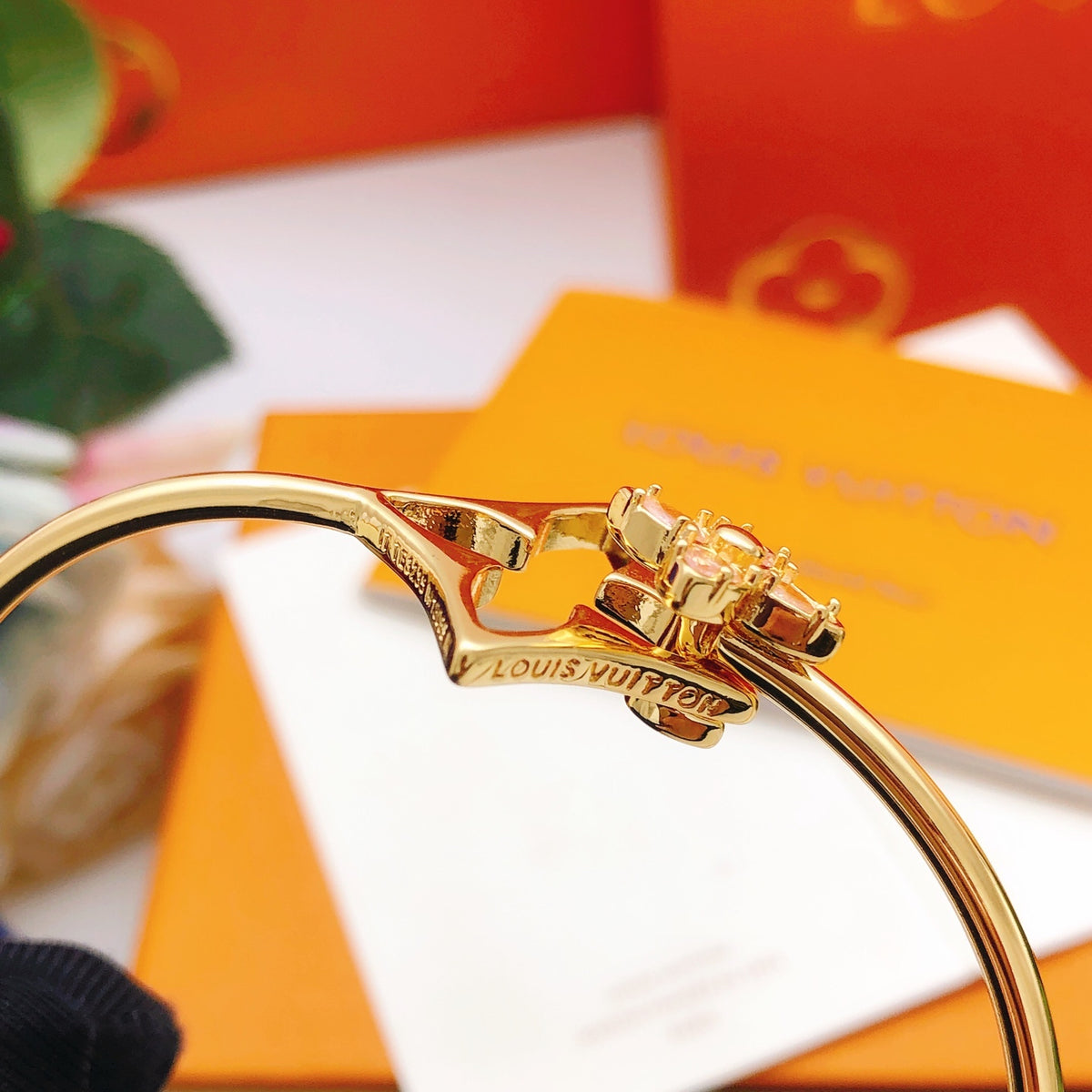 Geometric Emblem Bangle in Gold-Tone – Pink Detail detail view