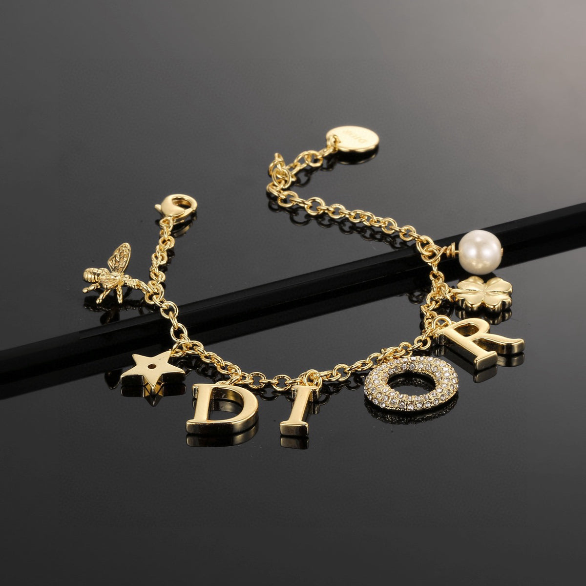 Graphic Letter Motif Statement Bracelet in Polished Metal-Tone with Vintage-Style Finish – Design 001 front view