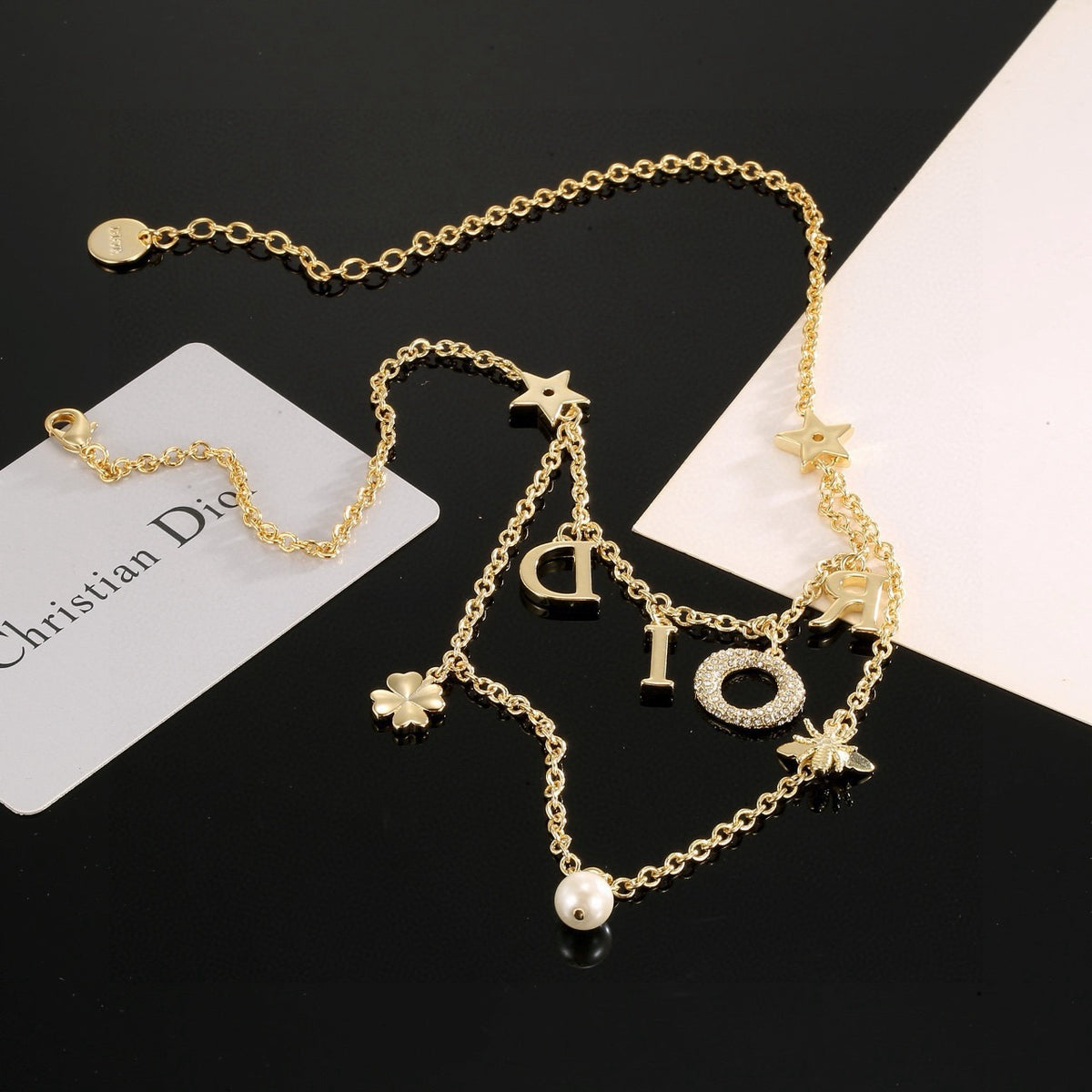 Graphic Letter Motif Pendant Necklace in Gold-Tone with Crystal-Style Accents – Design 001 detail view