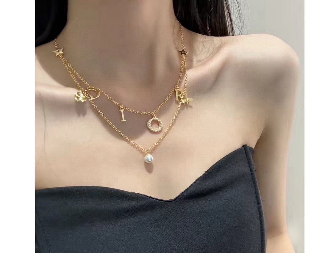 Graphic Letter Motif Pendant Necklace in Gold-Tone with Crystal-Style Accents – Design 001 front view