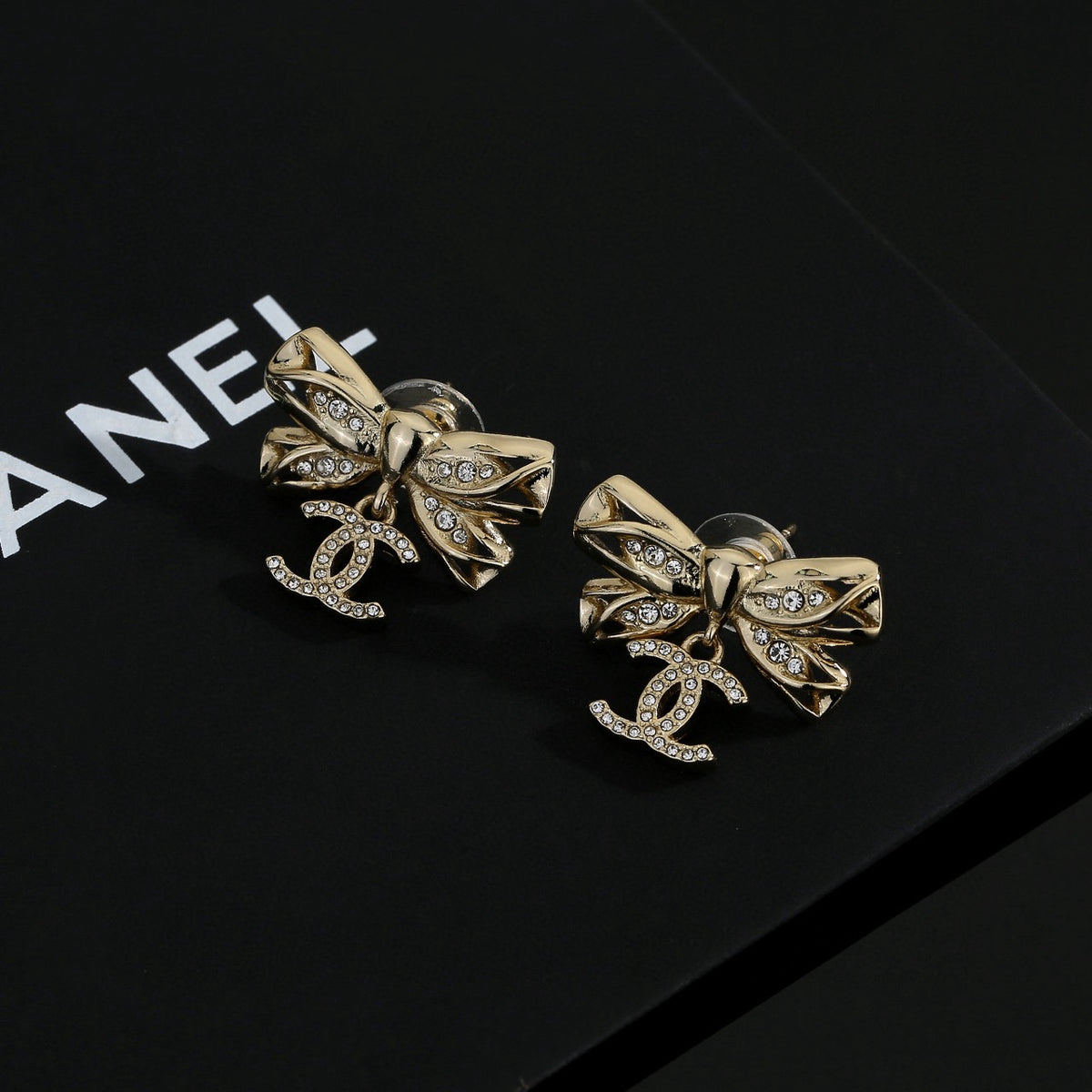 Double-C Emblem Stud Earrings in Polished Metal-Tone – Design 185 side detail