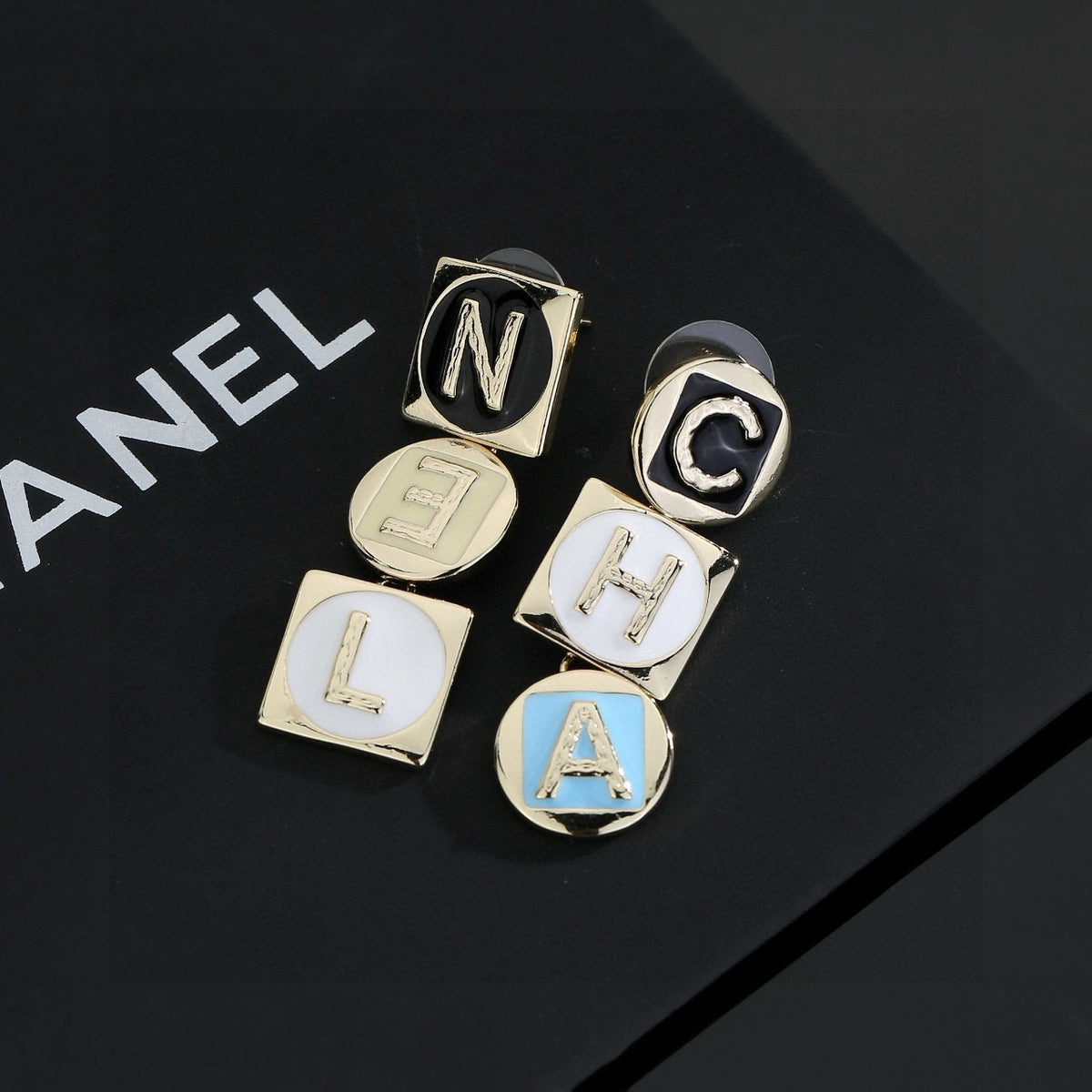 Letter Stud Earrings in Polished Metal-Tone – Design 008 styled product view