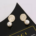 Geometric Emblem Stud Earrings in Polished Metal-Tone – Design 029 main product view