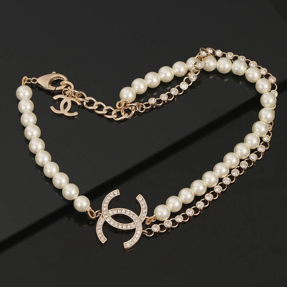 Double-C Emblem Pearl-Detail Pendant Necklace – Pearl Detail – Design 031 close-up detail