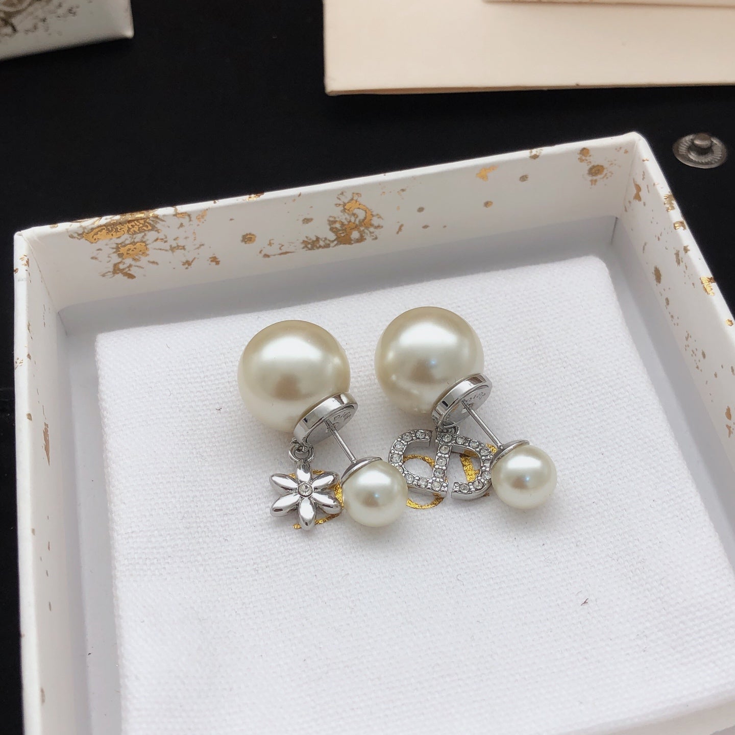 Floral Motif Stud Earrings in Polished Metal-Tone with Crystal-Style Accents – Design 002 styled view