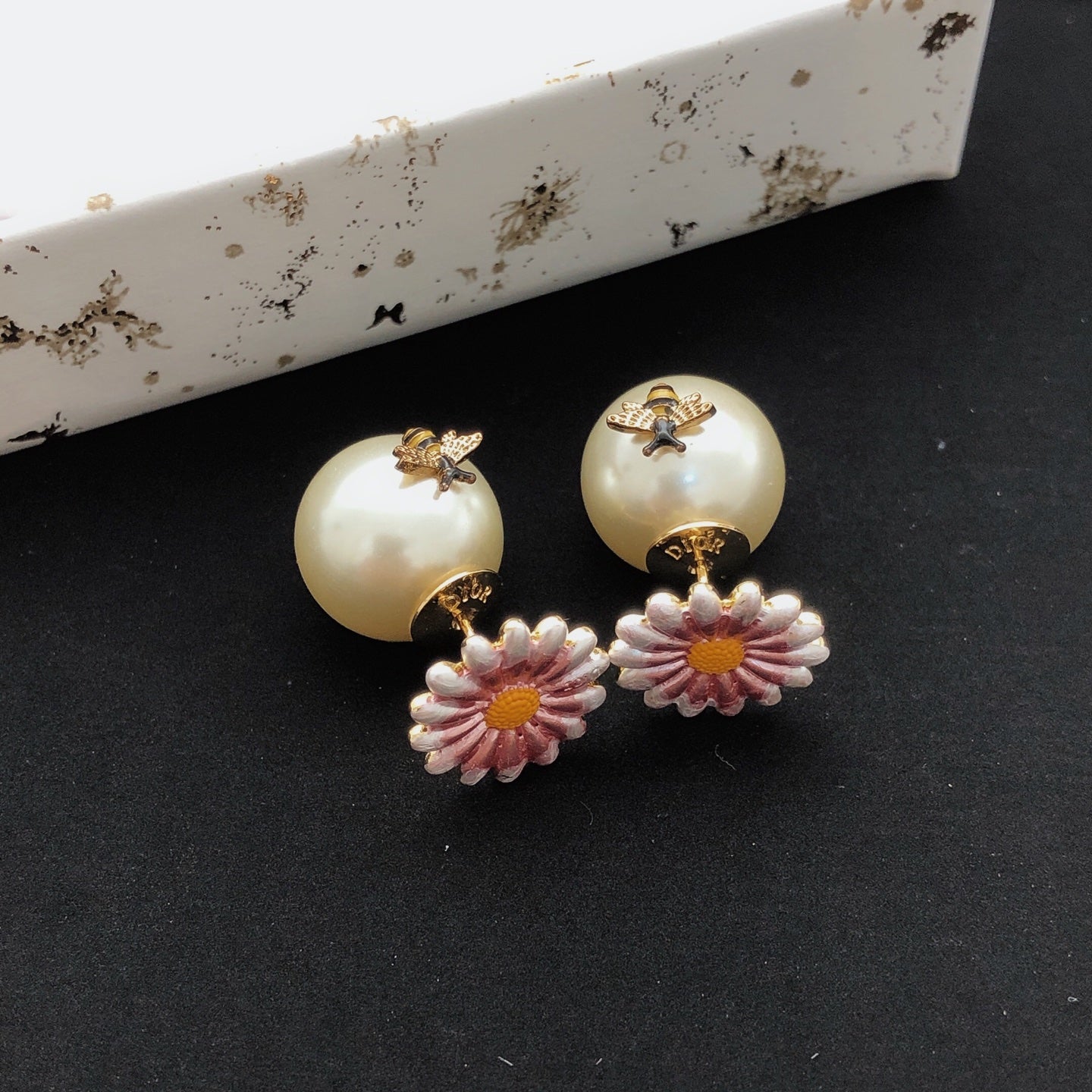 Floral Motif Stud Earrings in Polished Metal-Tone styled view