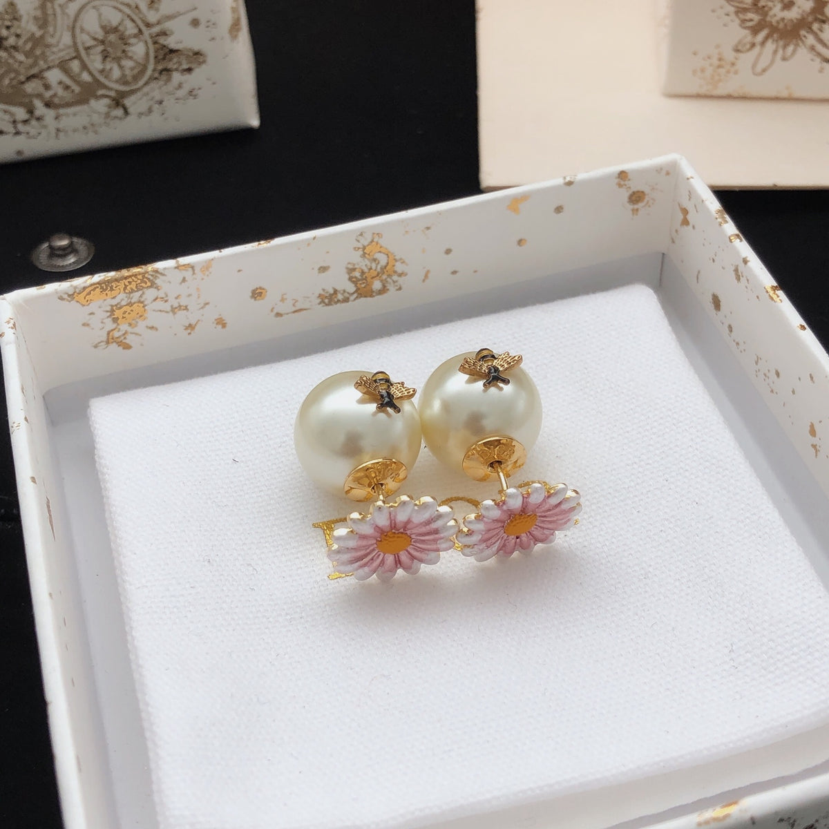 Floral Motif Stud Earrings in Polished Metal-Tone close-up detail