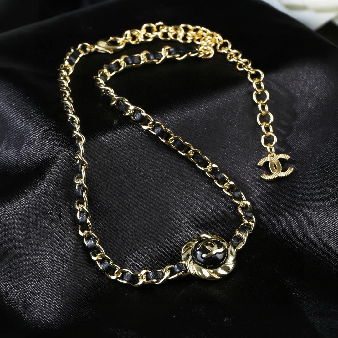 Double-C Emblem Pendant Necklace in Gold-Tone – Black Detail front product view