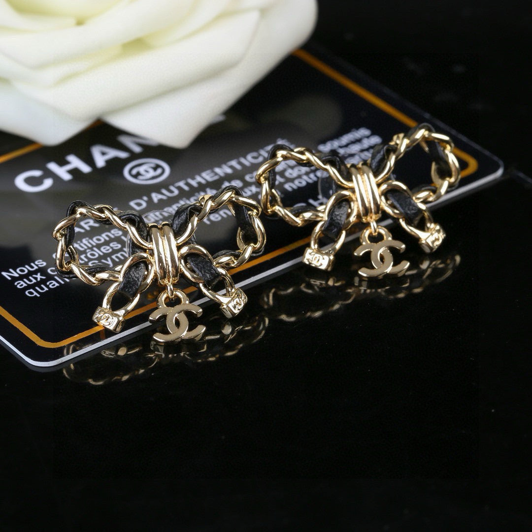 Bow Statement Earrings in Polished Metal-Tone – Design 002 front product view