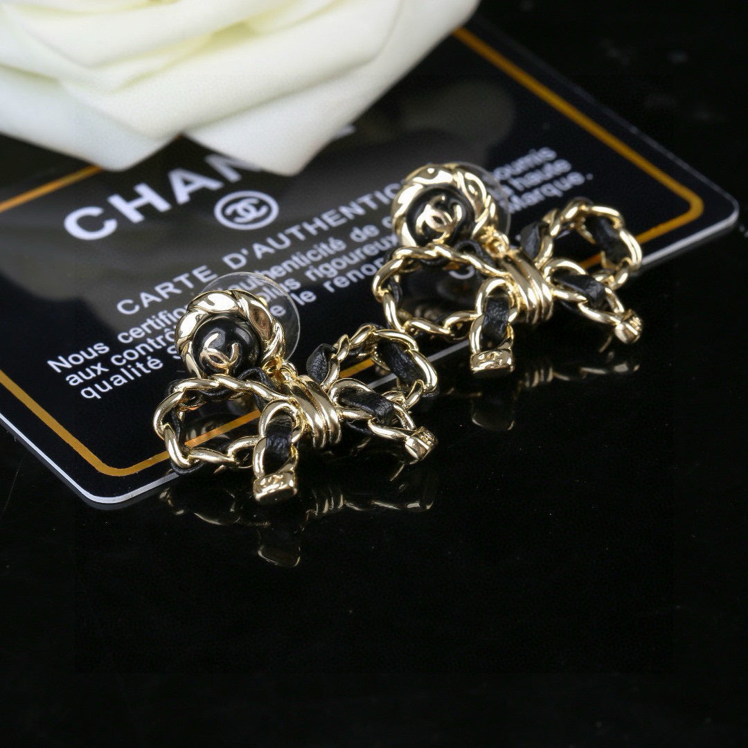 Bow Statement Earrings in Polished Metal-Tone – Design 001 front product view