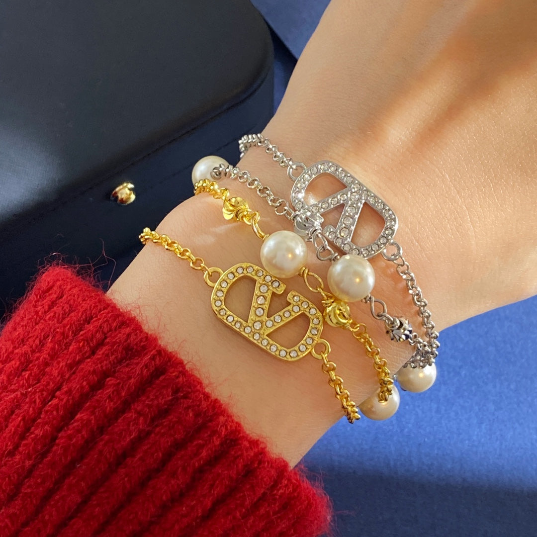 V Emblem Jewelry Accessory – White front view