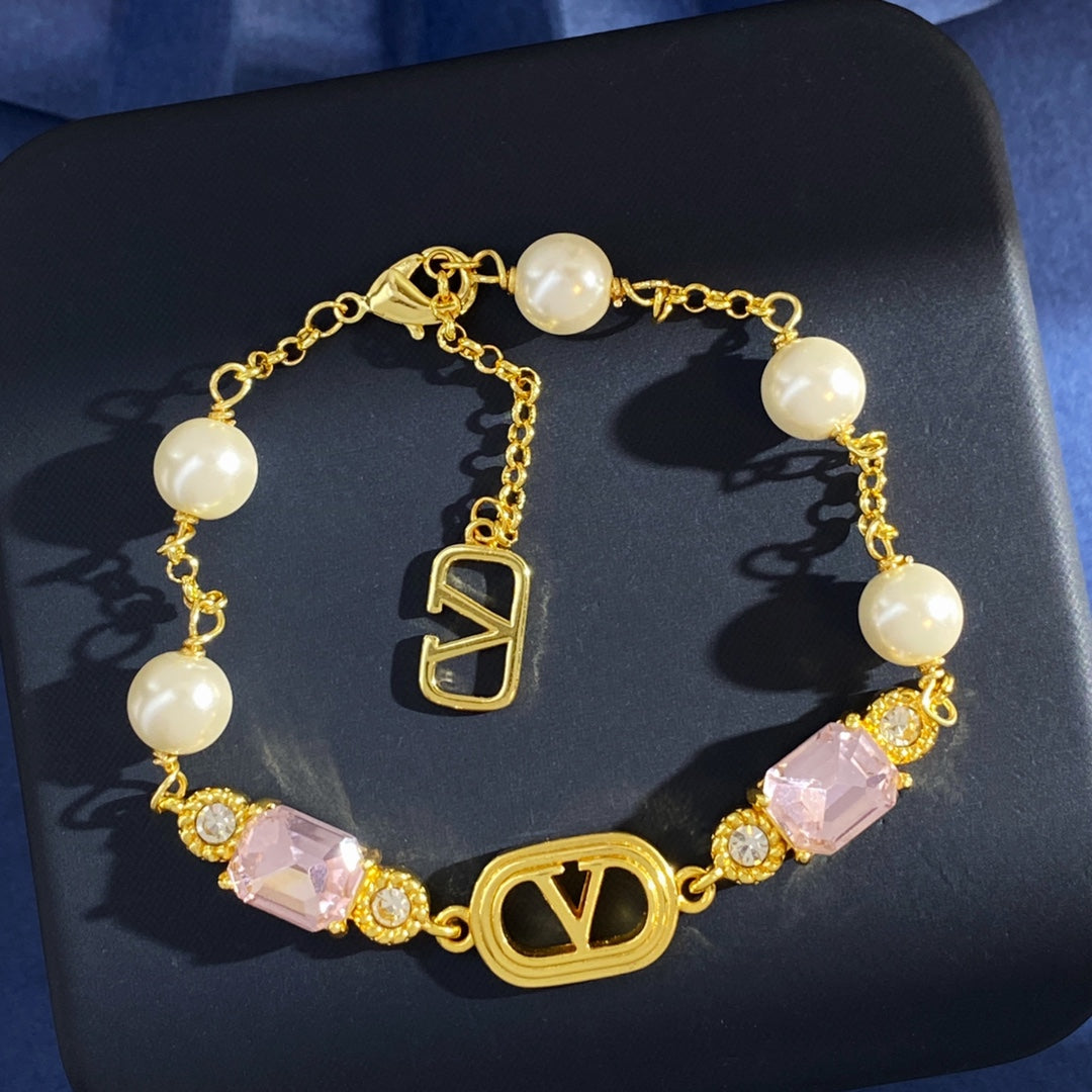 V Emblem Crystal-Accent Bracelet – Pink detail view