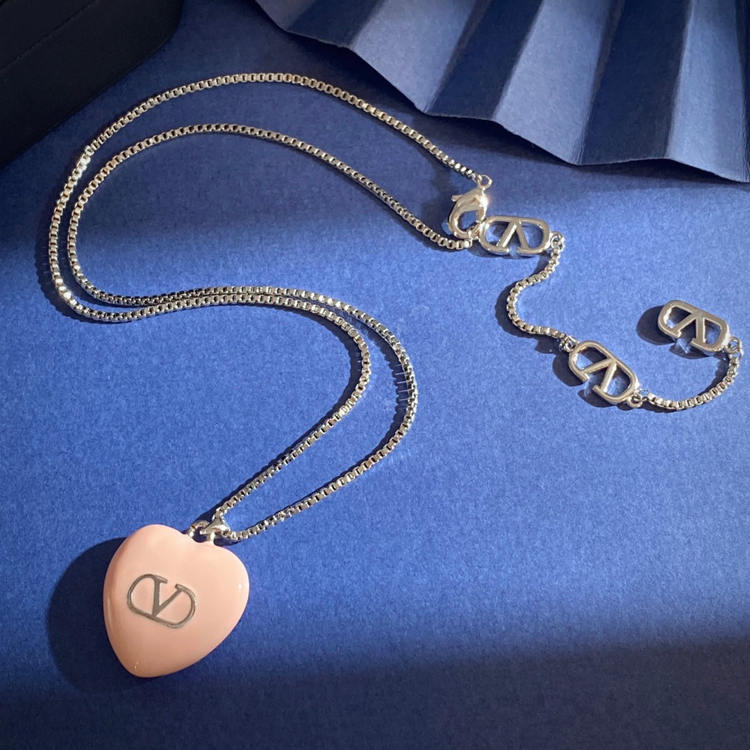 V Emblem Pendant Necklace in Gold-Tone – Pink front view