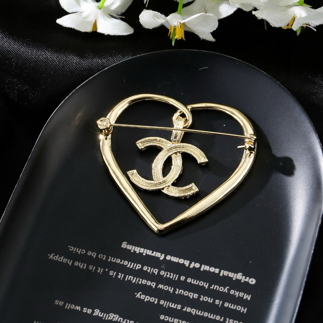 Signature Emblem Brooch in Polished Metal-Tone – Design 044 close-up detail