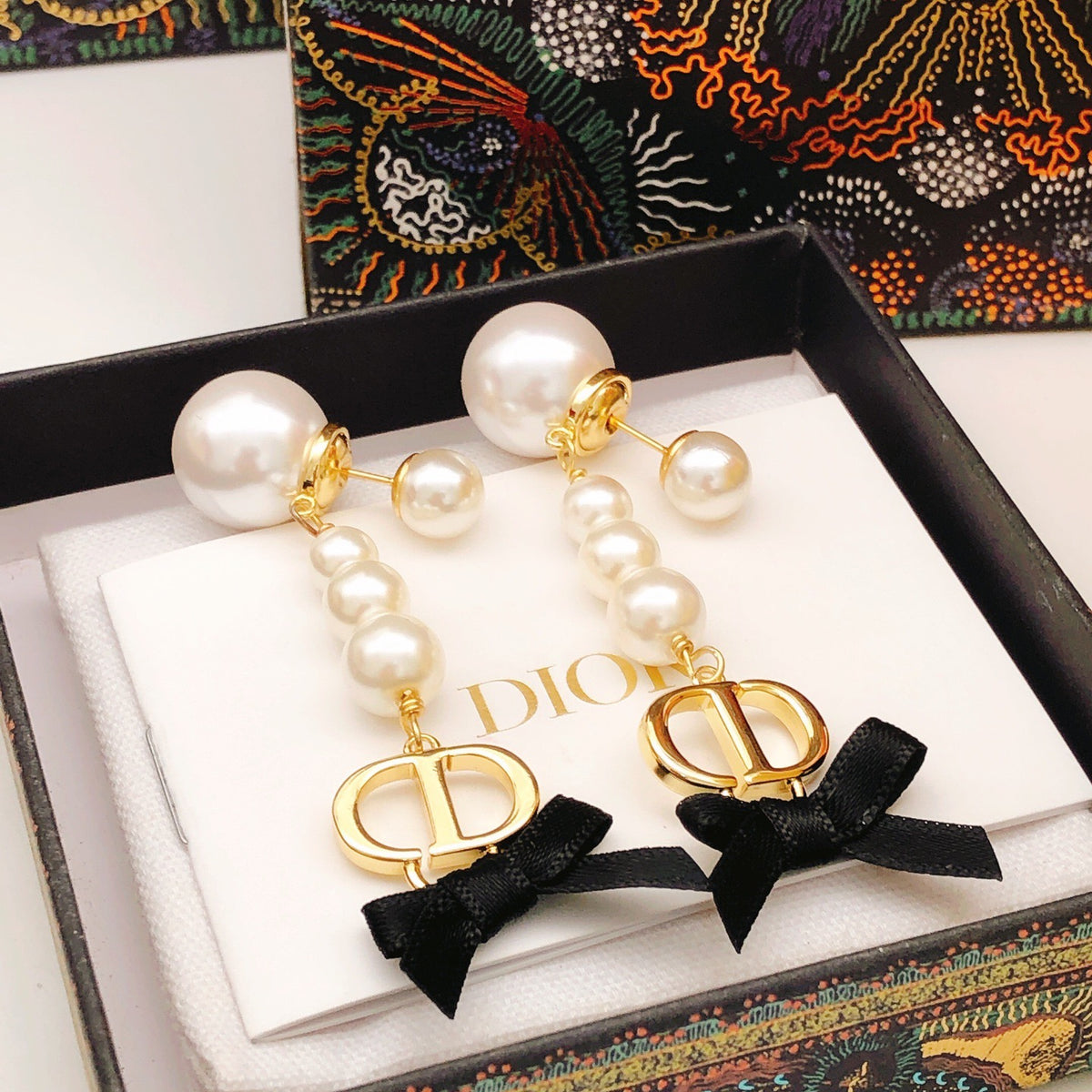 Bow & Butterfly Motif Stud Earrings in Polished Metal-Tone – Design 007 styled view