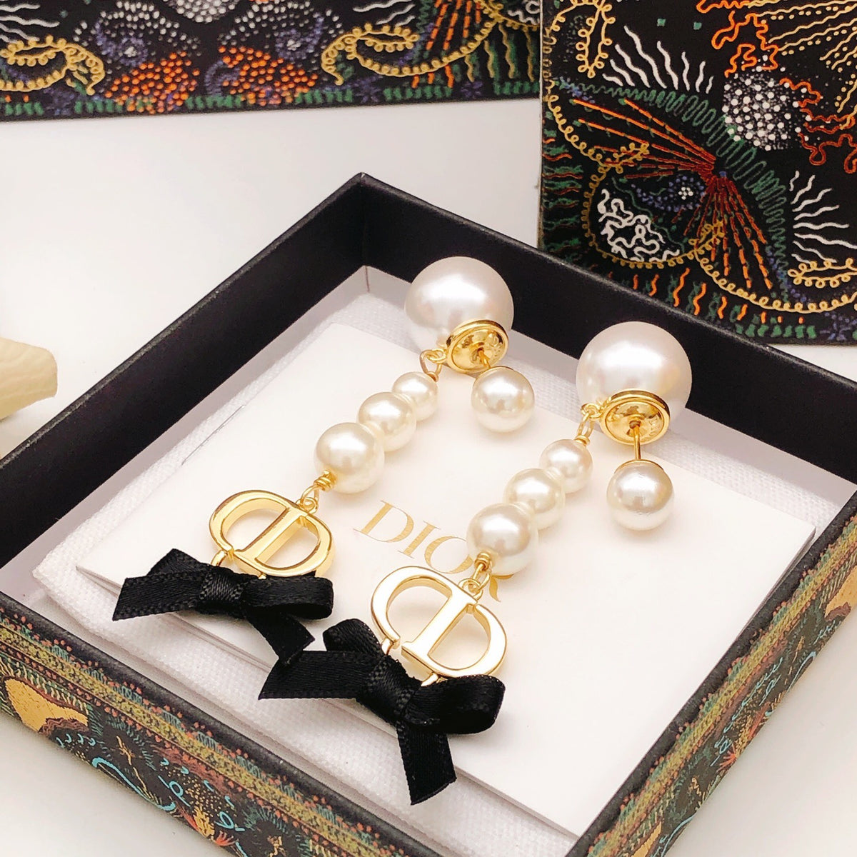 Bow & Butterfly Motif Stud Earrings in Polished Metal-Tone – Design 007 side detail