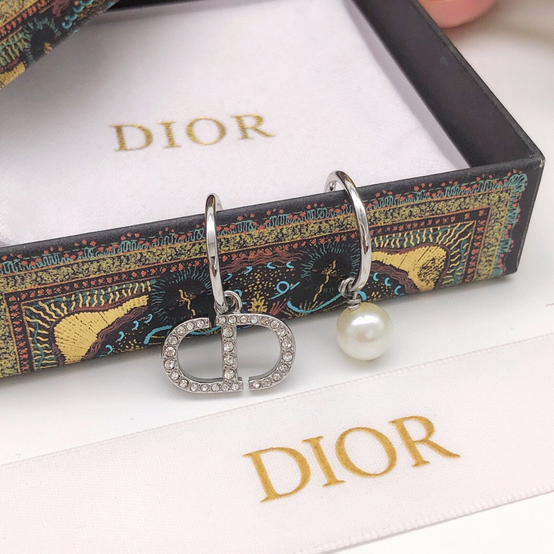 Sculptural Jewelry Accessory in Polished Metal-Tone with Crystal-Style Accents close-up detail