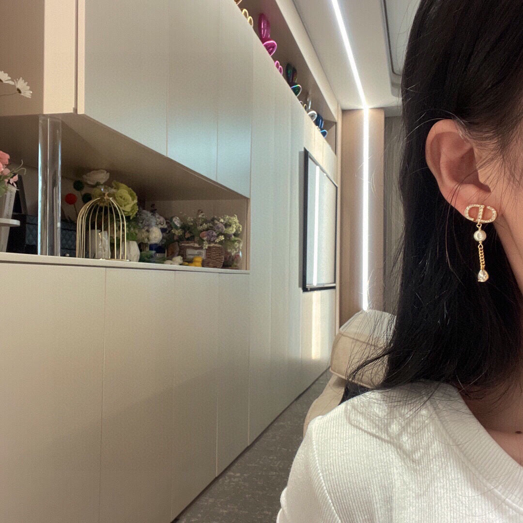 Pearl-Style Motif Stud Earrings in Polished Metal-Tone with Pearl-Style Detail – Design 021 styled view