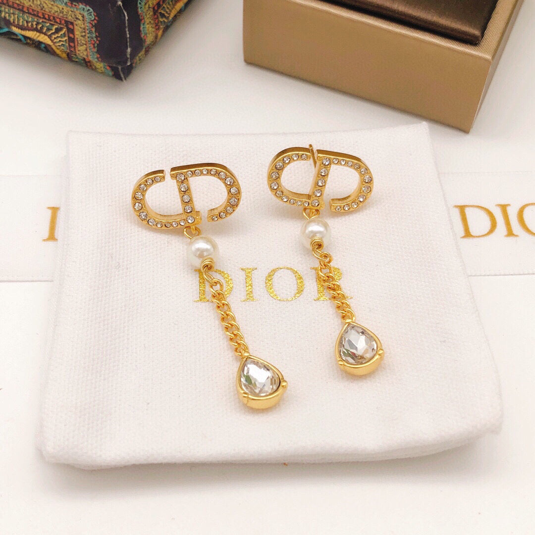 Pearl-Style Motif Stud Earrings in Polished Metal-Tone with Pearl-Style Detail – Design 021 front view