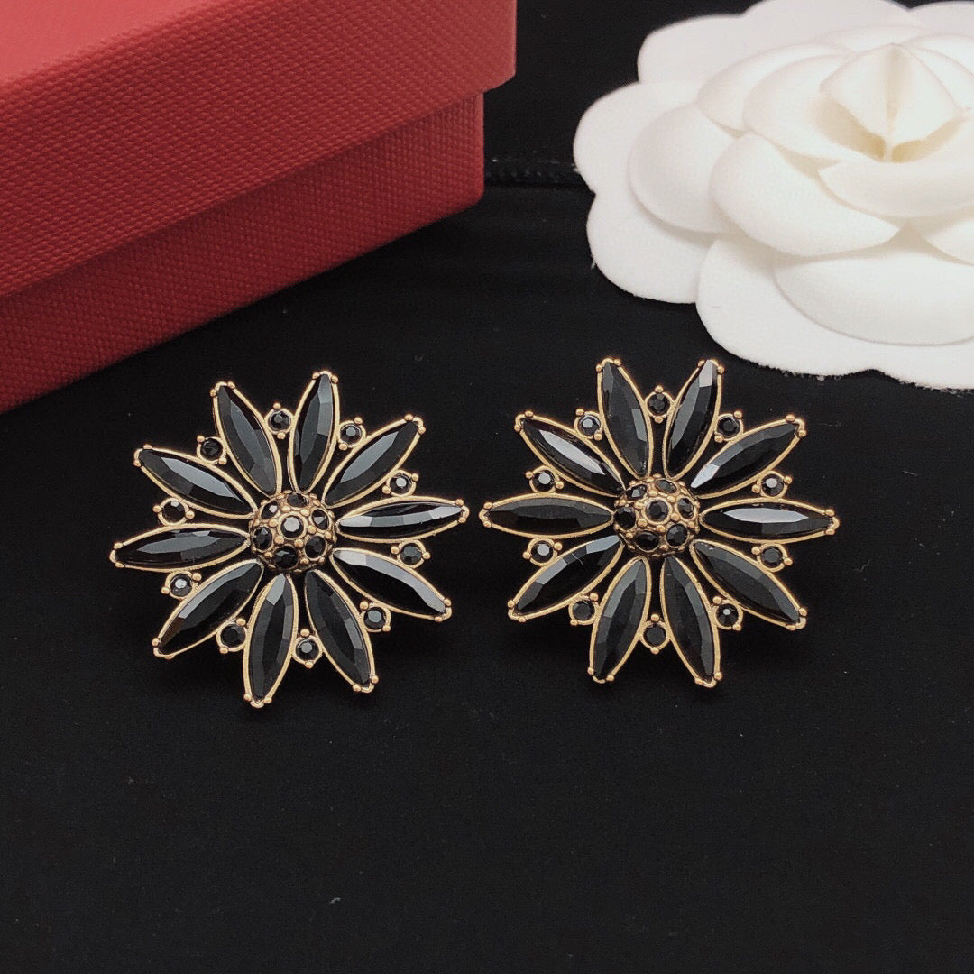 Sunburst Stud Earrings with Crystal-Style Accents close-up detail