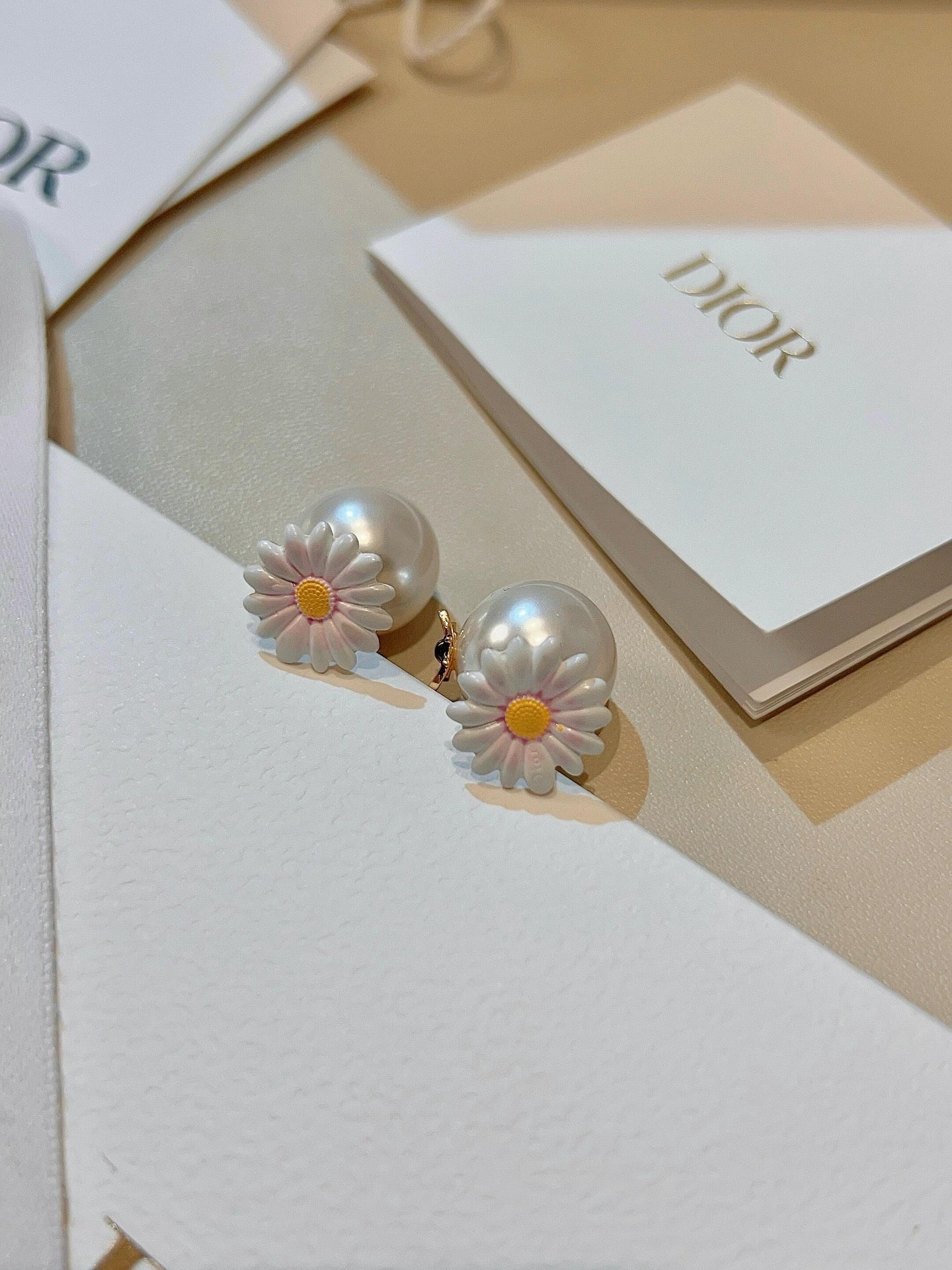 Floral Motif Stud Earrings in Polished Metal-Tone styled view