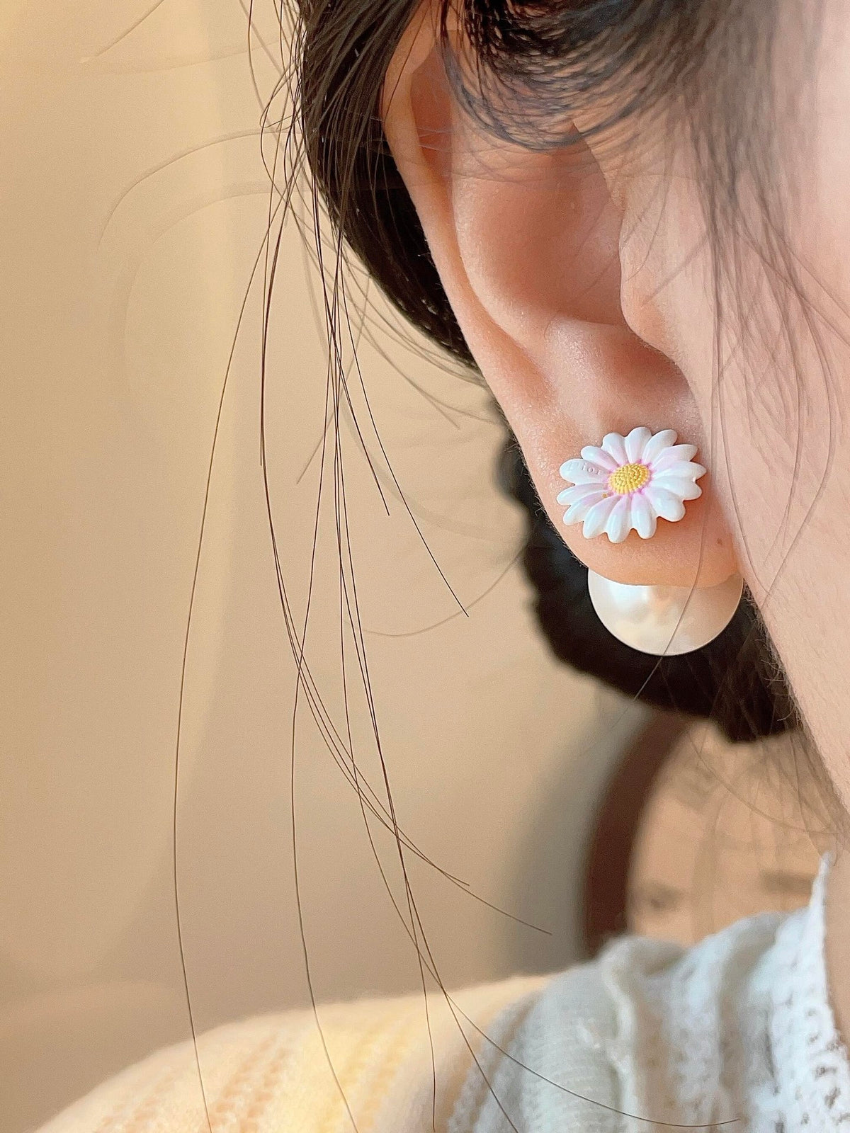 Floral Motif Stud Earrings in Polished Metal-Tone close-up detail