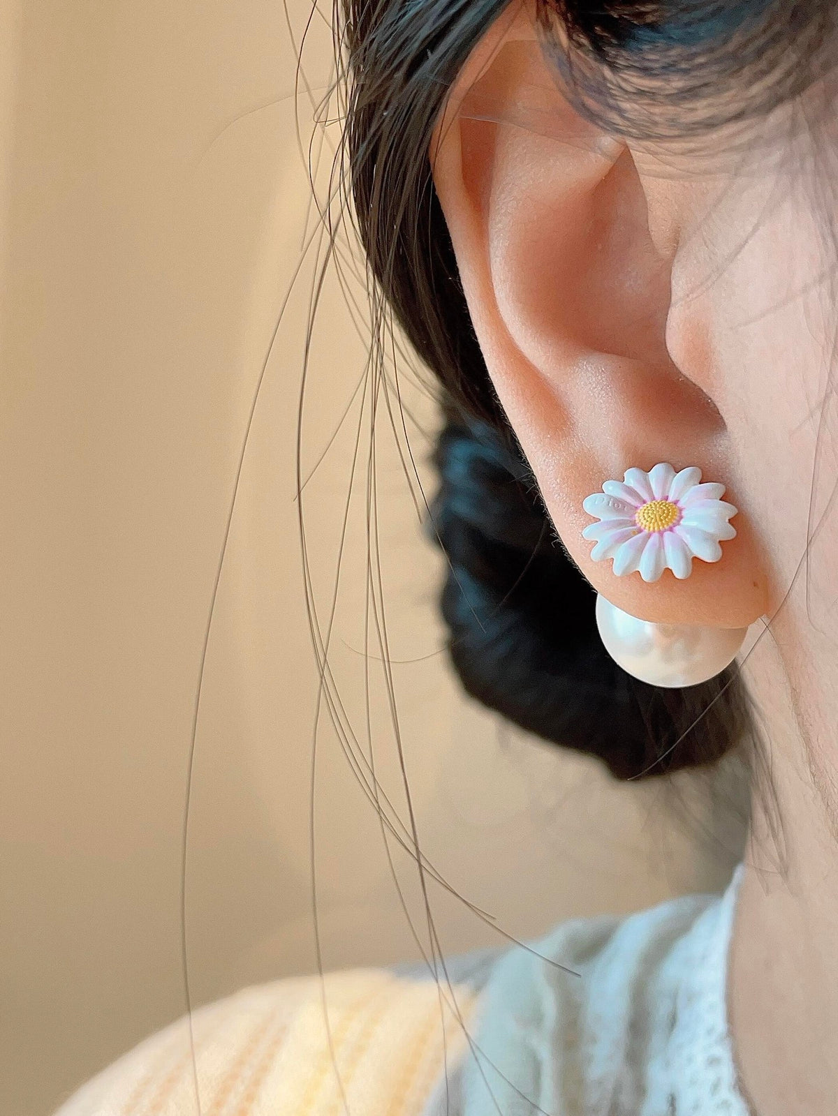 Floral Motif Stud Earrings in Polished Metal-Tone detail view