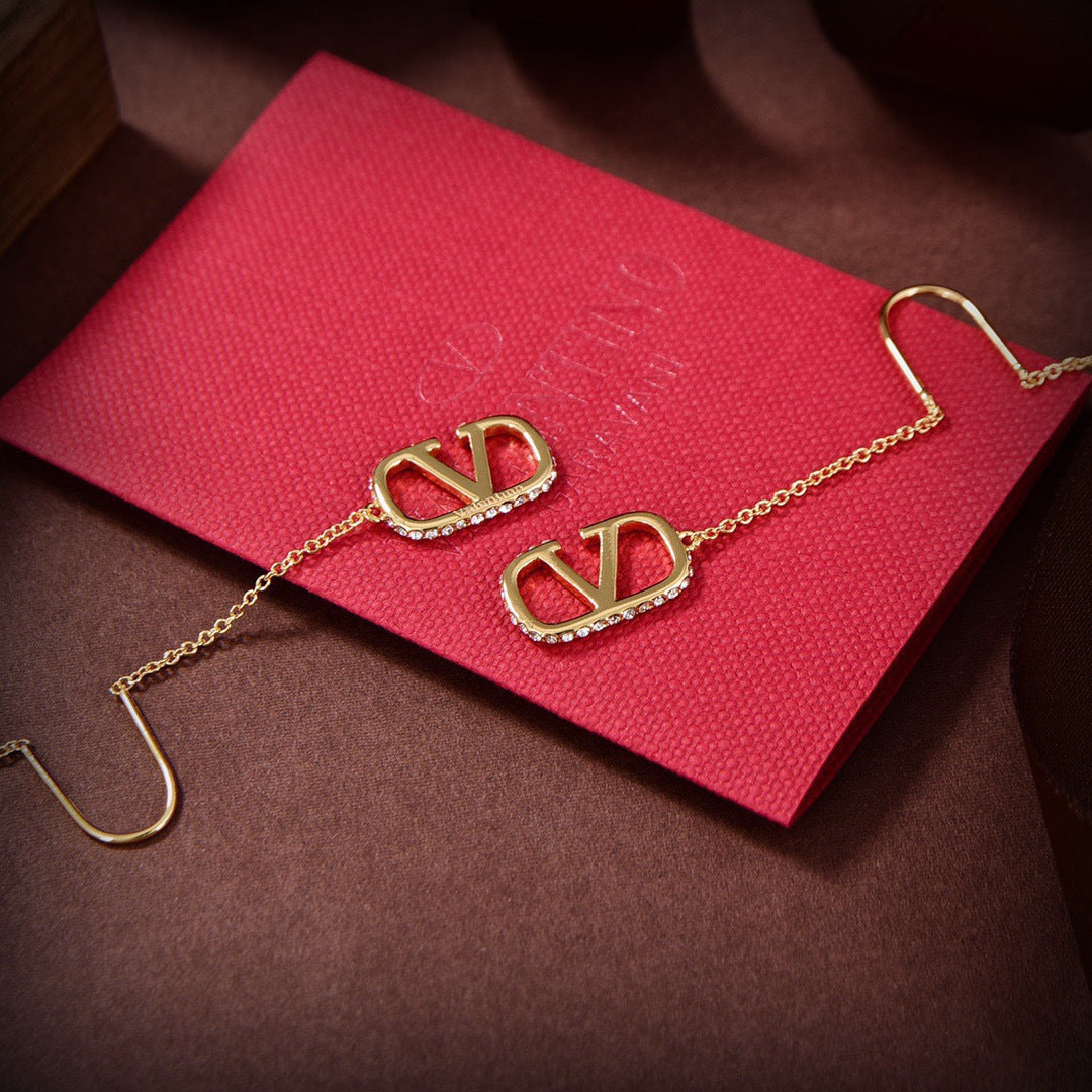 Signature Emblem Stud Earrings in Gold-Tone – Design 11 detail view