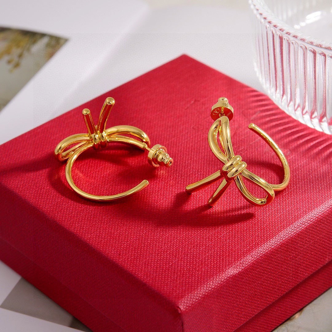 Bow Stud Earrings in Polished Metal-Tone – Design 01 detail view