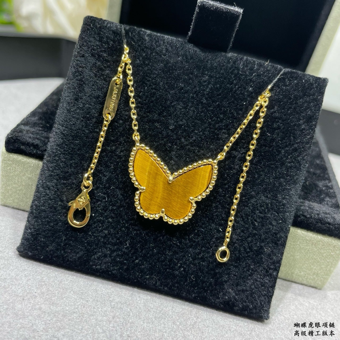 Butterfly Pendant Necklace in Polished Metal-Tone – Tiger-Eye close-up detail