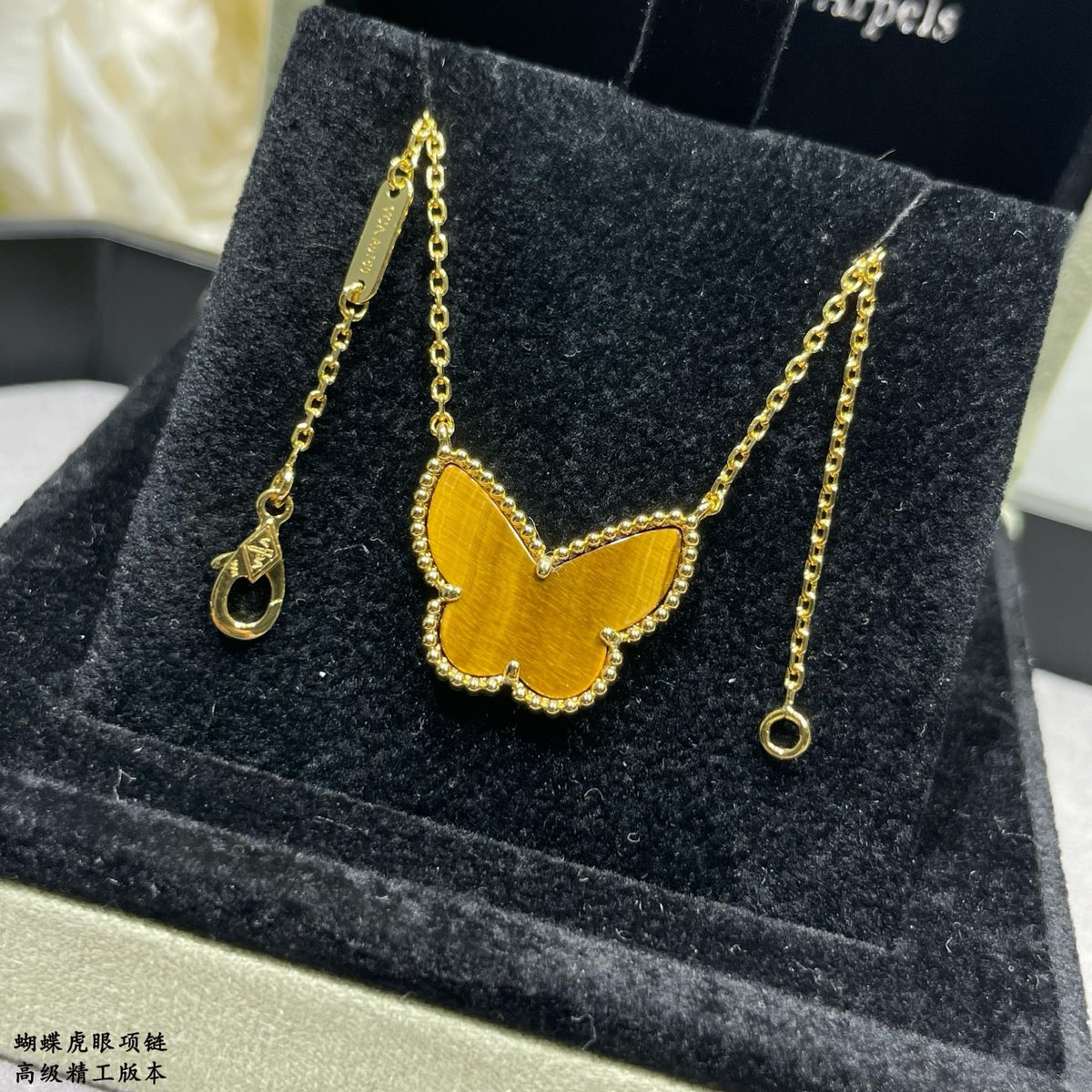 Butterfly Pendant Necklace in Polished Metal-Tone – Tiger-Eye detail view