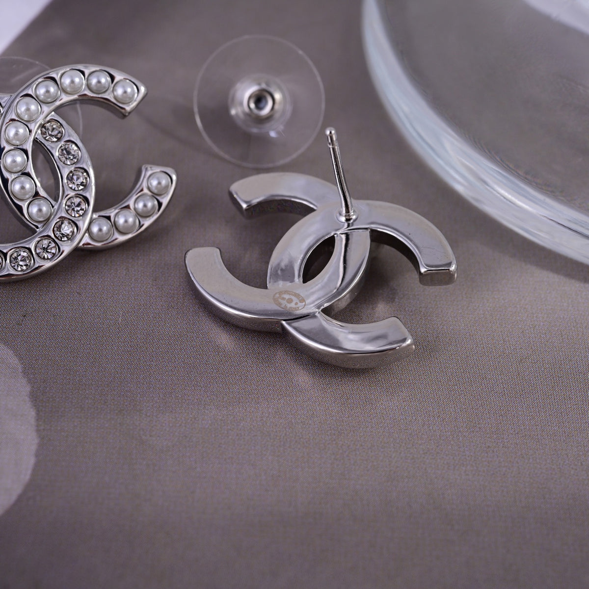 Signature Emblem Stud Earrings in Polished Metal-Tone – Design 010 detail view