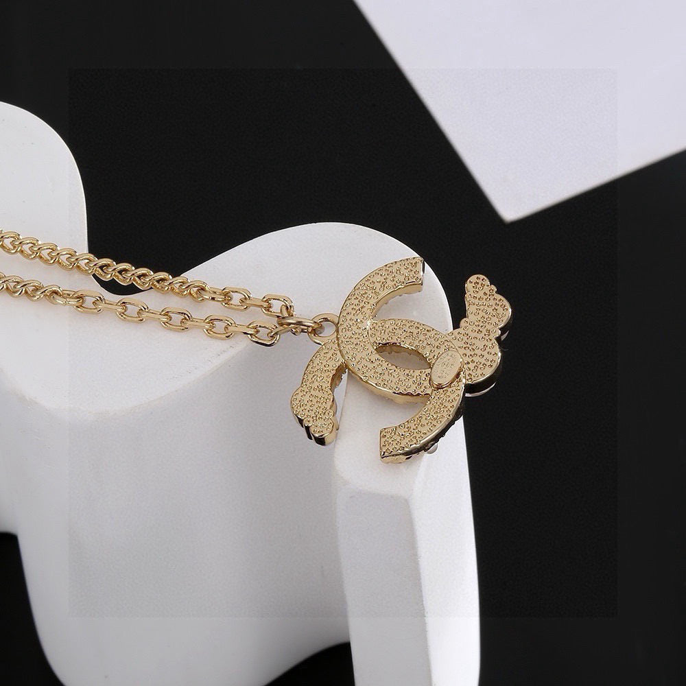 Double-C Emblem Pearl-Detail Pendant Necklace – Pearl Detail – Design 015 styled product view