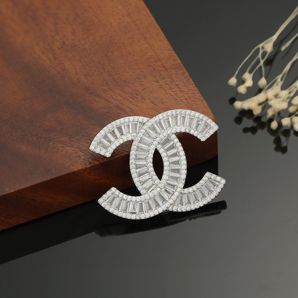 Signature Emblem Brooch in Polished Metal-Tone – Design 007 close-up detail