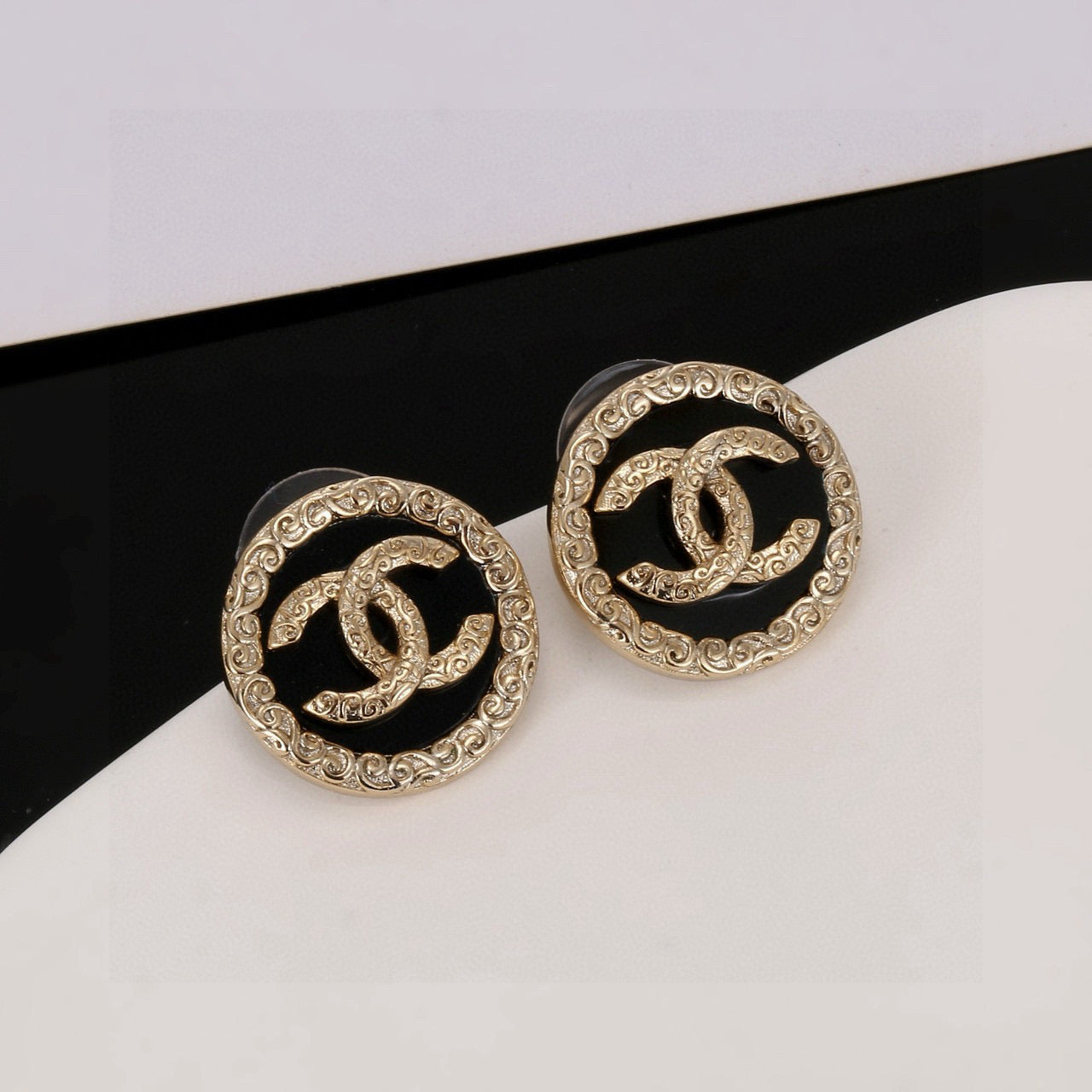 Double-C Emblem Stud Earrings in Black-Tone – Black Detail close-up detail