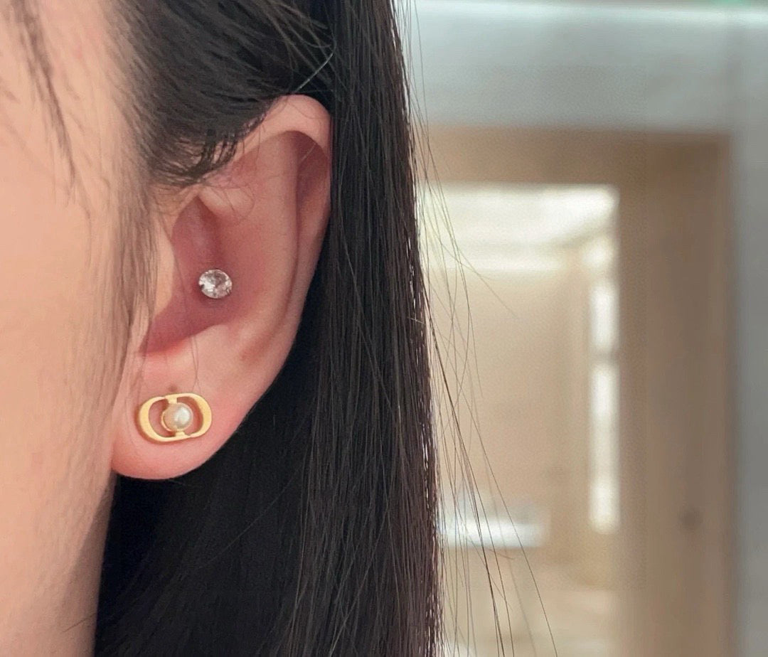Graphic Letter Motif Stud Earrings in Gold-Tone – Design 001 detail view