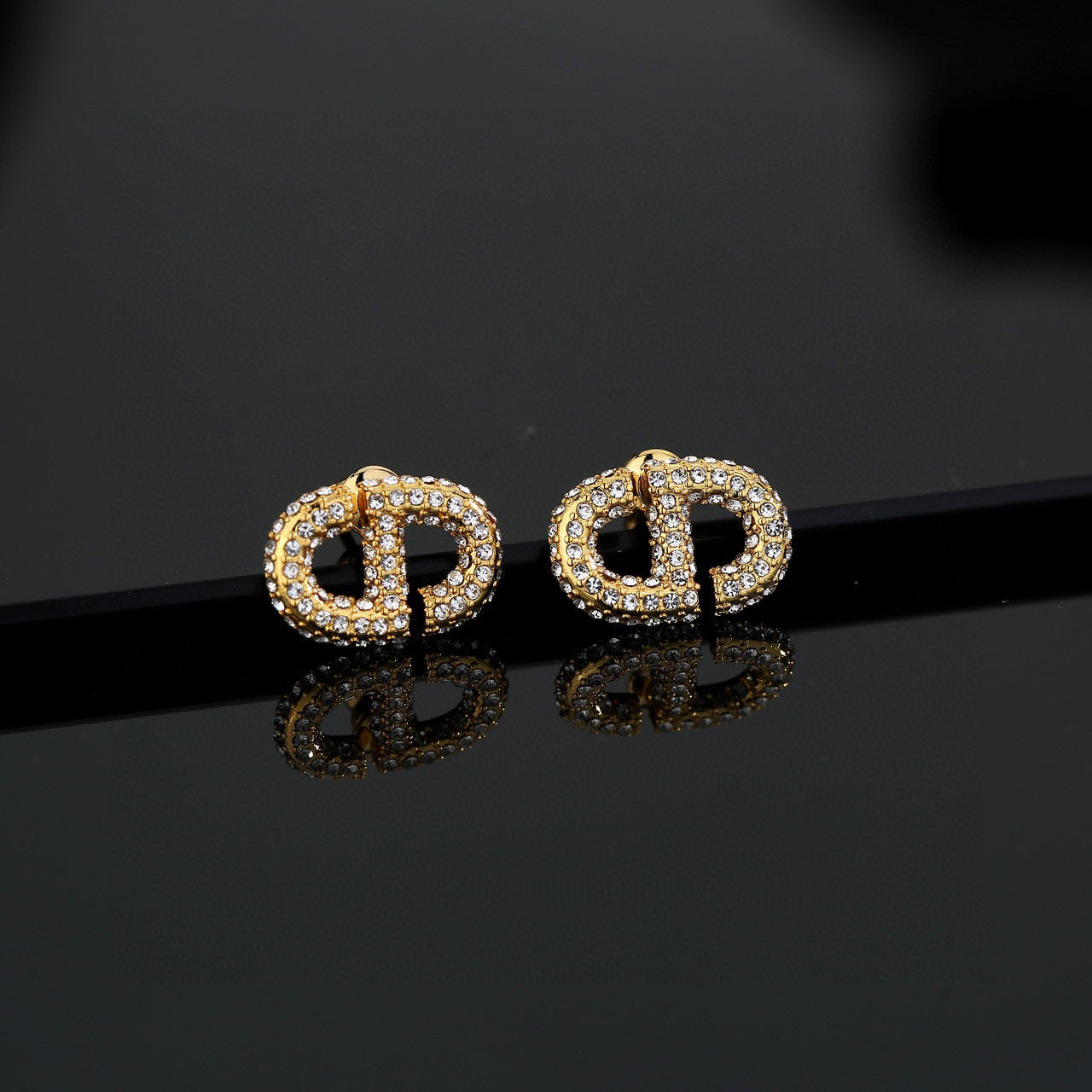 Graphic Letter Motif Stud Earrings in Polished Metal-Tone with Vintage-Style Finish – Design 005 close-up detail