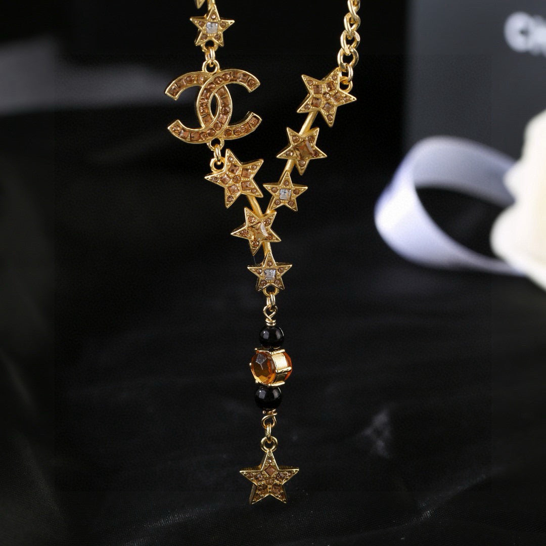 Signature Emblem Pendant Necklace in Polished Metal-Tone – White Detail detail view