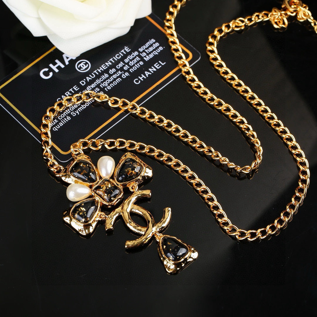 Double-C Emblem Pendant Necklace in Gold-Tone – Design 001 detail view