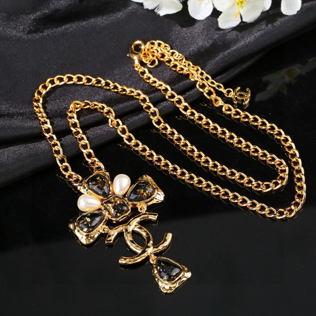 Double-C Emblem Pendant Necklace in Gold-Tone – Design 001 styled product view
