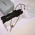 Martin Graham pendant necklace in polished metal-tone – main product view